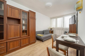 10th Floor Apartment with a Nice City View in Wrocław by Noclegi Renters
